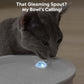 A cat is drinking water from Uahpet GLOW pet water fountain